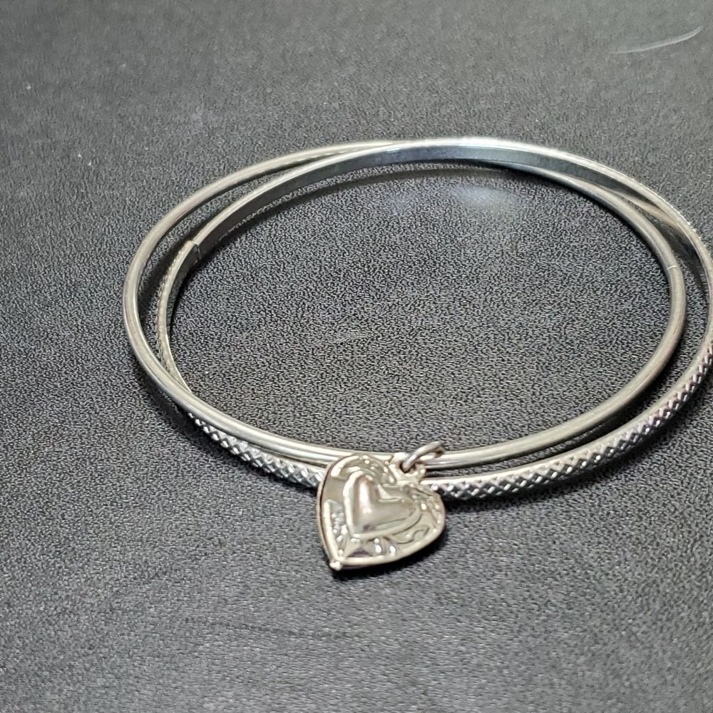 Silver tone double bangle with heart charm 8"